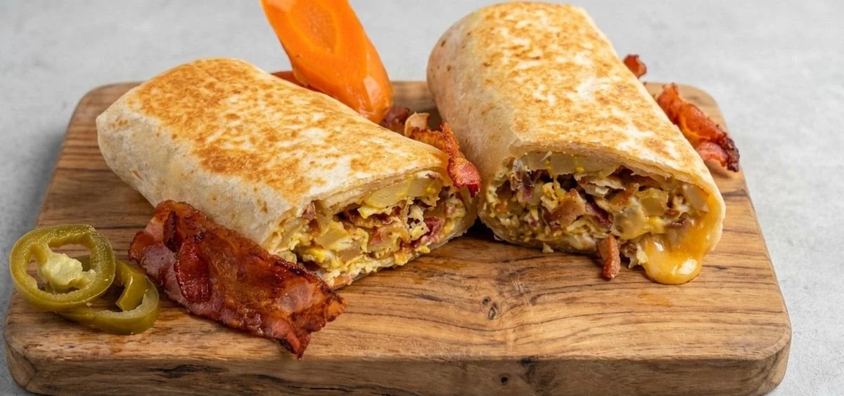 Breakfast burrito with egg, bacon and cheese